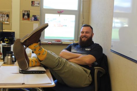 On his last day at JBHS, Mr. Colby Sites (Faculty) shows off his crazy taco socks. 