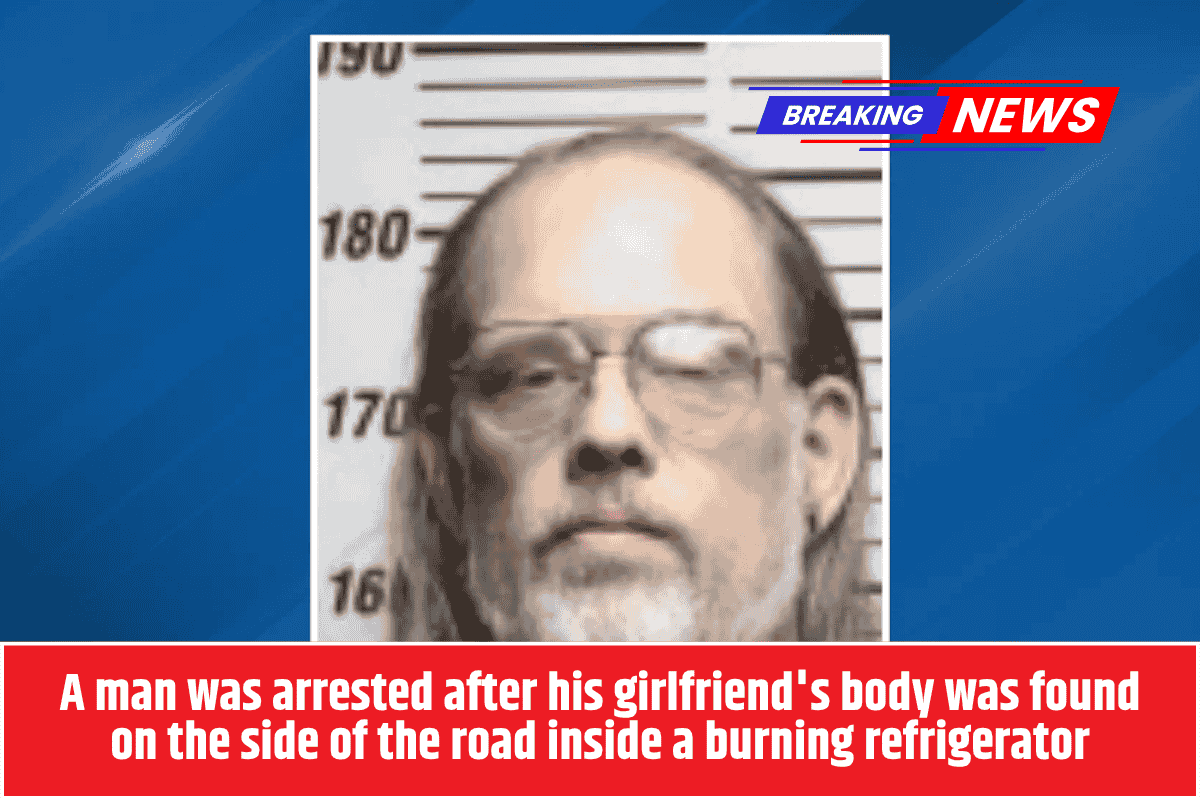 A man was arrested after his girlfriend's body was found on the side of the road inside a burning refrigerator